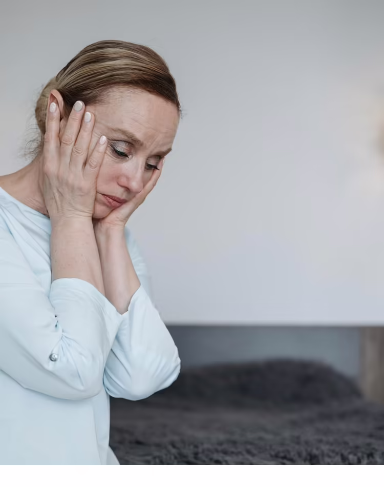 Mujer con dolor de cabeza